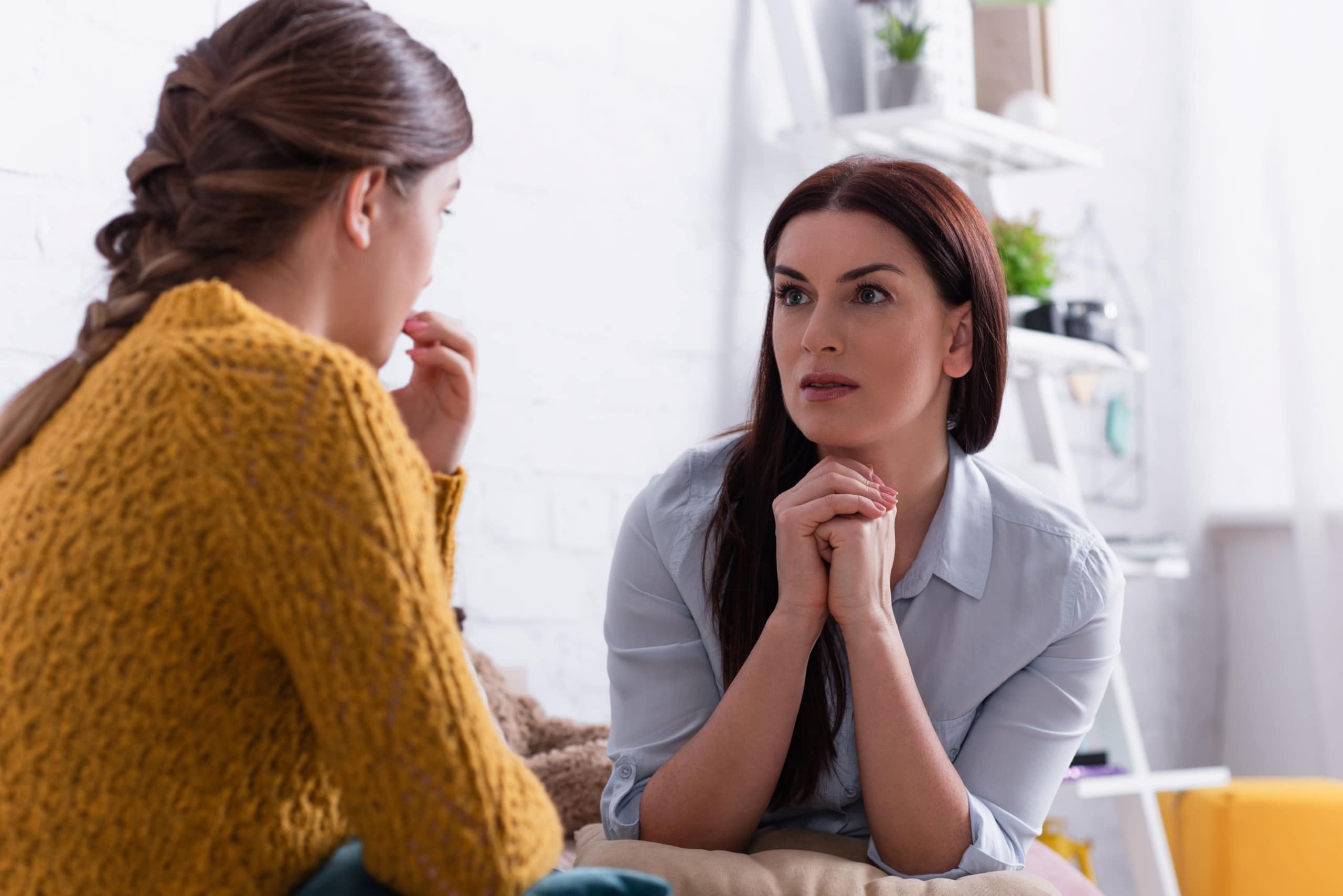 Worried Parent and Daughter